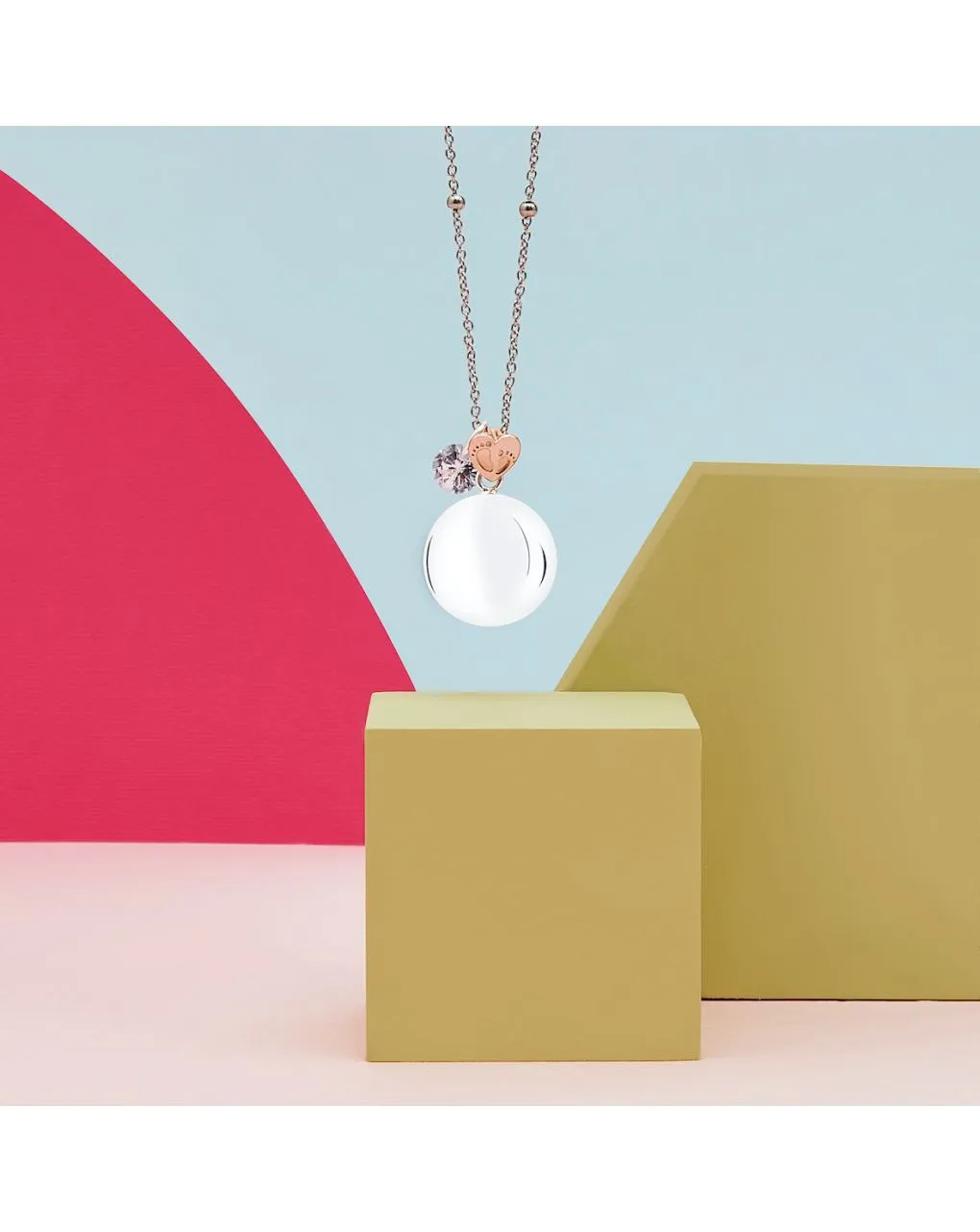             Mamijux chiama angeli con cuore centrale con piedini incisi in oro rosa        